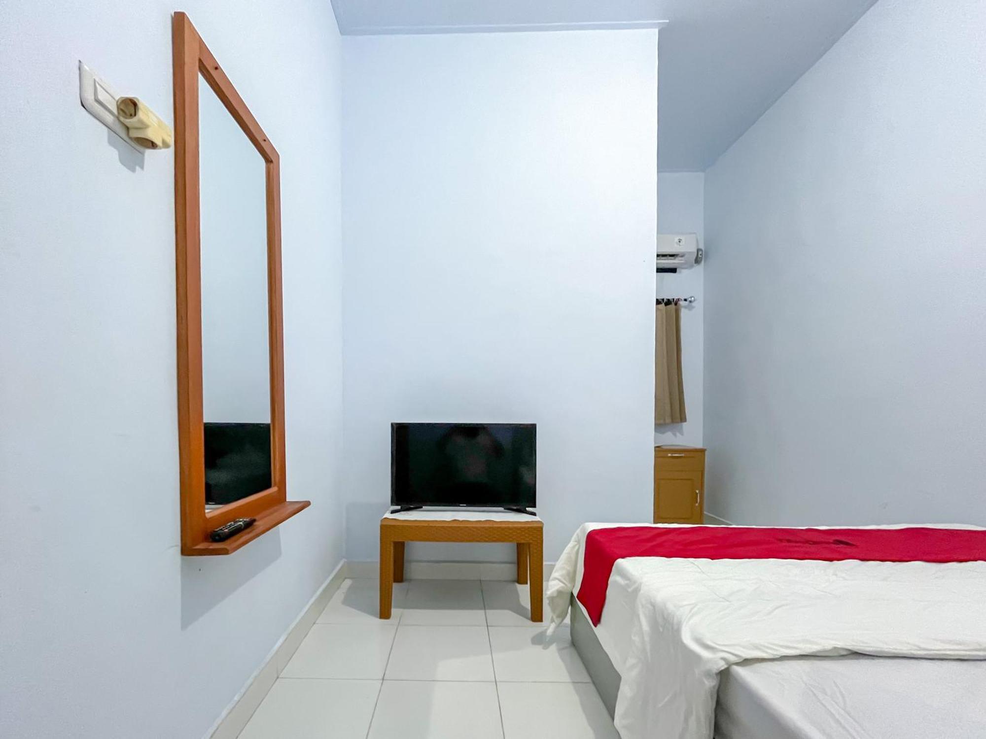 Reddoorz Syariah At Home Ampana Guest House Ampana Kota Extérieur photo